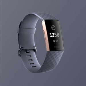 Fitbit charge 3 rose color with light blue band
